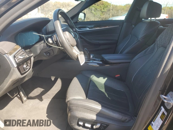 2019 BMW 5 Series M550i xDrive with VIN WBAJB9C57KB289036, listed as a Copart auction lot 86292134 with 28,103 mi miles and Salvage title. Bid and sale history available at DreamBid. Image 7.