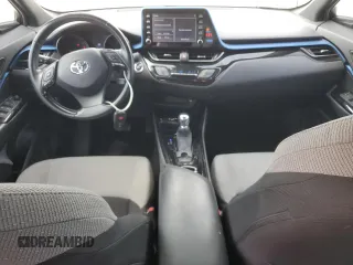 2019 Toyota C-HR XLE z VIN NMTKHMBX5KR079425, wystawiony jako Copart lot #57315345 z przebiegiem 109 441 mil mil oraz Szkoda całkowita • Salvage title. Historia ofert i sprzedaży dostępna na DreamBid. Obrazek 8.