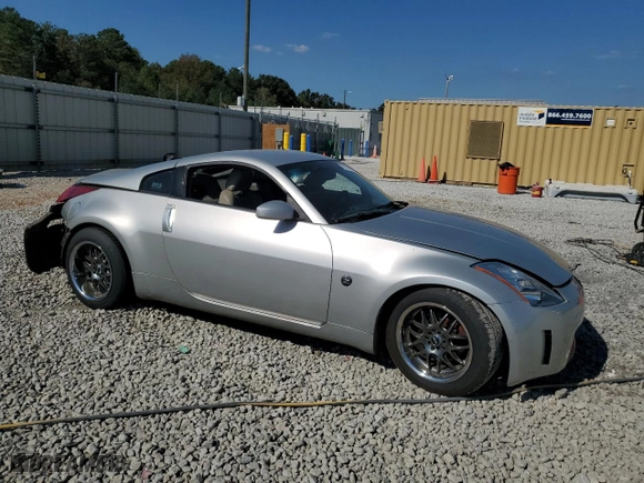 2003 Nissan 350Z Enthusiast with VIN JN1AZ34DX3T108690, listed as a Copart auction lot 77674144 with 153,380 mi miles and Salvage Title. Bid and sale history available at carsss.com. Image 4.
