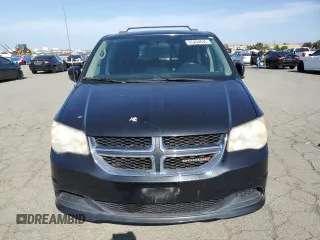 2014 Dodge Grand Caravan SXT z VIN 2C4RDGCG0ER321403, wystawiony jako Copart lot #55204635 z przebiegiem 219 510 mil mil oraz Tytuł czysty. Historia ofert i sprzedaży dostępna na DreamBid. Obrazek 5.