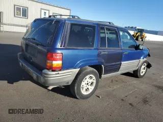 1997 Jeep Grand Cherokee Limited with VIN 1J4GZ78Y8VC737860, listed as a Copart auction lot 72981354 with 292,652 mi miles and Salvage Title. Bid and sale history available at carsss.com. Image 3.