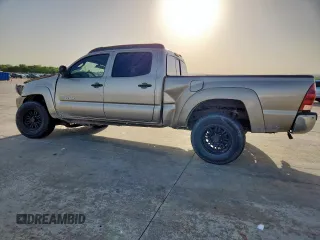 2005 Toyota Tacoma PreRunner z VIN 3TMKU72N85M003408, wystawiony jako Copart lot #57670935 z przebiegiem 247 189 mil mil oraz Szkoda całkowita • Salvage title. Historia ofert i sprzedaży dostępna na DreamBid. Obrazek 2.