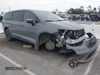 2023 Chrysler Pacifica Hybrid Touring L with VIN 2C4RC1L71PR584485, listed as a IAAI auction lot 42056423 with 58,955 mi miles and . Bid and sale history available at DreamBid. Image 1.
