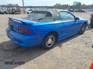 1998 Ford Mustang with VIN 1FAFP4441WF119648, listed as a IAAI auction lot 41588074 with 128,343 mi miles. Bid and sale history available at carsss.com. Image 4.