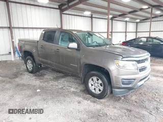 2015 Chevrolet Colorado 2WD WT z VIN 1GCGSAE34F1270479, wystawiony jako IAAI lot #41768612 z przebiegiem 158 984 mil mil oraz . Historia ofert i sprzedaży dostępna na DreamBid. Obrazek 1.