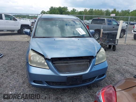 2007 Honda Odyssey EX z VIN 5FNRL38467B087065, wystawiony jako IAAI lot #42204370 z przebiegiem 242 844 mil mil oraz . Historia ofert i sprzedaży dostępna na DreamBid. Obrazek 13.