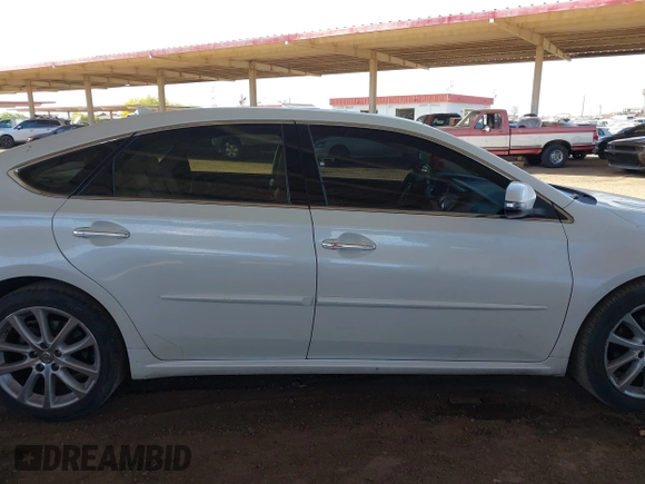 2015 Toyota Avalon Limited with VIN 4T1BK1EB2FU170909, listed as a IAAI auction lot 42035089 with 239,385 mi miles and . Bid and sale history available at DreamBid. Image 13.