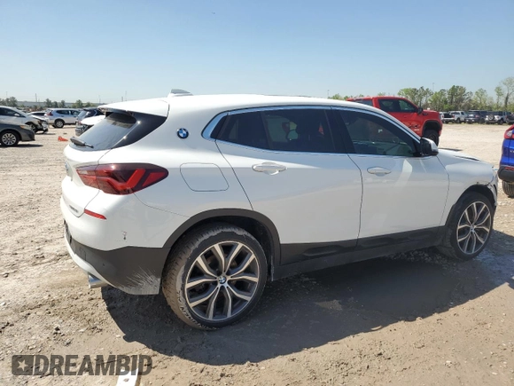 2023 BMW X2 sDrive28i with VIN WBXYH9C00P5V38984, listed as a Copart auction lot 50739725 with 47,287 mi miles and Salvage Title. Bid and sale history available at carsss.com. Image 3.