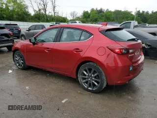 2018 Mazda 3 Touring z VIN 3MZBN1L39JM260754, wystawiony jako Copart lot #58514675 z przebiegiem 62 946 mil mil oraz Czysty tytuł • Clean title. Historia ofert i sprzedaży dostępna na DreamBid. Obrazek 2.