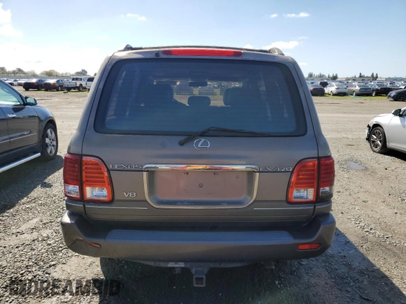 2000 Lexus LX 470 z VIN JT6HT00W9Y0120042, wystawiony jako Copart lot #49644355 z przebiegiem 188 992 mil mil oraz Czysty tytuł • Clean title. Historia ofert i sprzedaży dostępna na DreamBid. Obrazek 6.