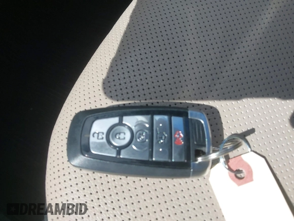 2022 Ford Escape Titanium with VIN 1FMCU9J93NUA99685, listed as a IAAI auction lot 41867437 with 36,987 mi miles and . Bid and sale history available at DreamBid. Image 11.