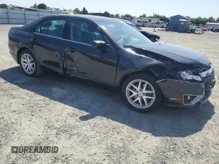 2012 Ford Fusion SEL with VIN 3FAHP0JG8CR250817, listed as a Copart auction lot 59789865 with 139,731 mi miles and Salvage title. Bid and sale history available at DreamBid. Image 4.