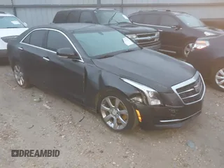2015 Cadillac ATS Luxury RWD z VIN 1G6AB5R35F0121403, wystawiony jako IAAI lot #41823829 z przebiegiem 194 632 mil mil oraz . Historia ofert i sprzedaży dostępna na DreamBid. Obrazek 1.