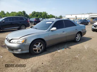 2000 Lexus ES 300 with VIN JT8BF28G7Y5086215, listed as a Copart auction lot 62748645 with 97,410 mi miles and Salvage title. Bid and sale history available at DreamBid. Image 1.