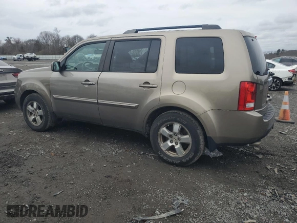 2011 Honda Pilot EX-L with VIN 5FNYF4H64BB022010, listed as a Copart auction lot 52857855 with 169,619 mi miles and Clean Title. Bid and sale history available at carsss.com. Image 2.