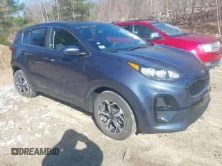 2020 Kia Sportage LX with VIN KNDPM3AC2L7656080, listed as a IAAI auction lot 41880254 with 34,023 mi miles and . Bid and sale history available at DreamBid. Image 1.