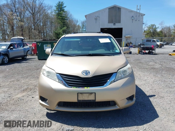 2012 Toyota Sienna LE AAS with VIN 5TDKK3DC9CS184090, listed as a IAAI auction lot 42123891 with 162,065 mi miles. Bid and sale history available at carsss.com. Image 12.