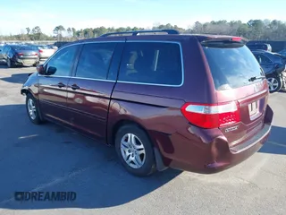2007 Honda Odyssey EX with VIN 5FNRL38487B440275, listed as a IAAI auction lot 41588030 with 280,937 mi miles. Bid and sale history available at carsss.com. Image 3.