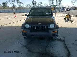 2003 Jeep Liberty Sport with VIN 1J4FK481X3W725304, listed as a Copart auction lot 87003384 with 185,646 mi miles and Salvage Title. Bid and sale history available at DreamBid. Image 10.