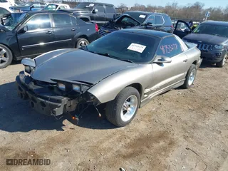 2000 Pontiac Firebird with VIN 2G2FS22K0Y2147688, listed as a IAAI auction lot 41753278 with 166,861 mi miles. Bid and sale history available at carsss.com. Image 2.