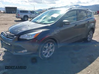 2016 Ford Escape Titanium with VIN 1FMCU9J96GUB96009, listed as a IAAI auction lot 41866127 with 132,990 mi miles and . Bid and sale history available at DreamBid. Image 18.