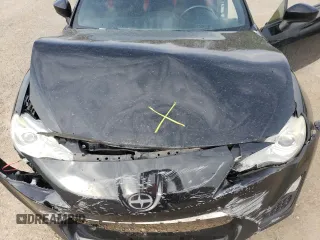 2014 Scion FR-S z VIN JF1ZNAA19E9709220, wystawiony jako Copart lot #54389725 z przebiegiem 123 443 mil mil oraz Szkoda całkowita • Salvage title. Historia ofert i sprzedaży dostępna na DreamBid. Obrazek 11.
