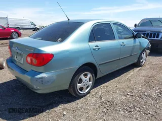 2005 Toyota Corolla CE with VIN 1NXBR32EX5Z373910, listed as a IAAI auction lot 42230582 with 64,004 mi miles and . Bid and sale history available at DreamBid. Image 4.