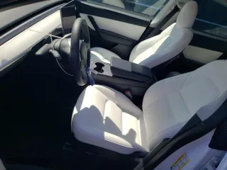2021 Tesla Model Y Standard Range with VIN 5YJYGDED9MF163013, listed as a Copart auction lot 47807245 with 47,458 mi miles and Salvage Title. Bid and sale history available at carsss.com. Image 7.