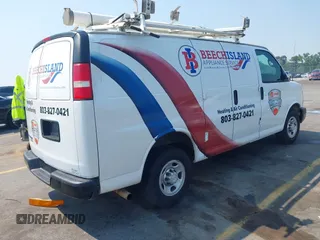 2015 Chevrolet Express Cargo Van with VIN 1GCWGFCF8F1255703, listed as a IAAI auction lot 41995763 with 215,212 mi miles. Bid and sale history available at carsss.com. Image 4.