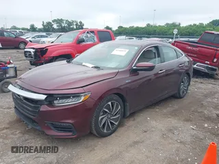 2020 Honda Insight Touring z VIN 19XZE4F93LE010040, wystawiony jako IAAI lot #42240572 z przebiegiem 52 299 mil mil oraz . Historia ofert i sprzedaży dostępna na DreamBid. Obrazek 17.