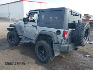 2013 Jeep Wrangler Rubicon 10th Anniversary with VIN 1C4BJWCG8DL639121, listed as a IAAI auction lot 40561773 with 56,023 mi miles and . Bid and sale history available at DreamBid. Image 3.
