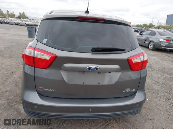 2013 Ford C-Max SEL z VIN 1FADP5BU2DL543029, wystawiony jako IAAI lot #42115325 z przebiegiem 131 855 mil mil oraz . Historia ofert i sprzedaży dostępna na DreamBid. Obrazek 16.