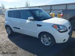2011 Kia Soul + with VIN KNDJT2A28B7716632, listed as a IAAI auction lot 41700107 with 156,991 mi miles. Bid and sale history available at carsss.com. Image 1.