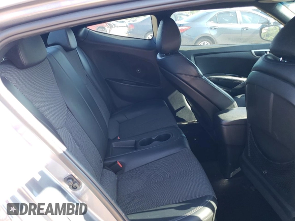 2016 Hyundai Veloster with VIN KMHTC6AD7GU248608, listed as a Copart auction lot 65809693 with 104,784 mi miles. Bid and sale history available at carsss.com. Image 10.