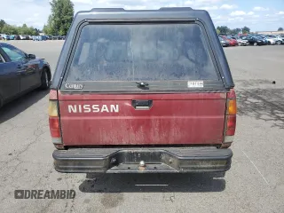1990 Nissan Frontier with VIN 1N6SD11SXLC310546, listed as a Copart auction lot 63304025 with 248,377 mi miles and Clean title. Bid and sale history available at DreamBid. Image 6.