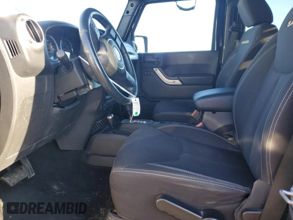 2014 Jeep Wrangler Sahara with VIN 1C4AJWBG9EL102983, listed as a Copart auction lot 84501554 with 120,372 mi miles and Salvage Title. Bid and sale history available at DreamBid. Image 7.