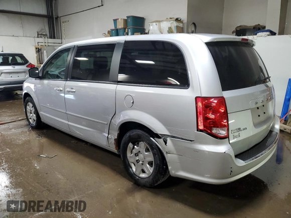 2012 Dodge Grand Caravan SE with VIN 2C4RDGBG5CR312016, listed as a Copart auction lot 52887255 with 96,355 mi miles and Salvage Title. Bid and sale history available at DreamBid. Image 2.