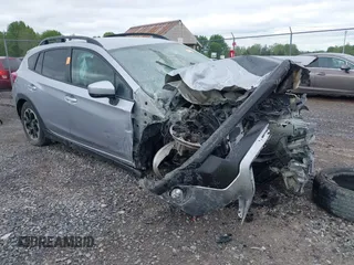 2021 Subaru Crosstrek Premium z VIN JF2GTAPC5M8331242, wystawiony jako IAAI lot #42306131 z przebiegiem 26 786 mil mil oraz . Historia ofert i sprzedaży dostępna na DreamBid. Obrazek 1.