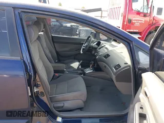 2007 Honda Civic Sdn LX with VIN 1HGFA16587L124463, listed as a IAAI auction lot 42042736 with 189,929 mi miles. Bid and sale history available at carsss.com. Image 5.