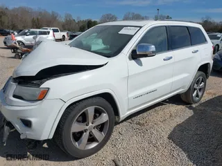 2014 Jeep Grand Cherokee Overland with VIN 1C4RJFCT6EC126897, listed as a IAAI auction lot 41826773 with 115,251 mi miles. Bid and sale history available at carsss.com. Image 17.