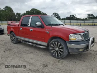 2003 Ford F-150 XLT with VIN 1FTRW07643KB48614, listed as a Copart auction lot 51895905 with 157,290 mi miles and Salvage Title. Bid and sale history available at carsss.com. Image 4.