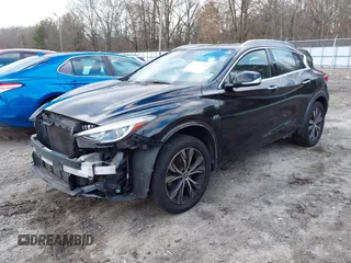 2017 Infiniti QX30 Premium z VIN SJKCH5CR8HA035885, wystawiony jako IAAI lot #41606308 z przebiegiem 112 932 mil mil oraz . Historia ofert i sprzedaży dostępna na DreamBid. Obrazek 18.