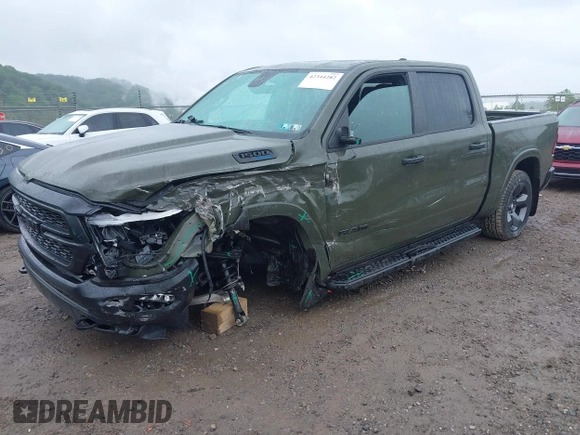 2021 Ram 1500 Lone Star with VIN 1C6SRFFT6MN695393, listed as a IAAI auction lot 42344282 with 12,796 mi miles and . Bid and sale history available at DreamBid. Image 18.