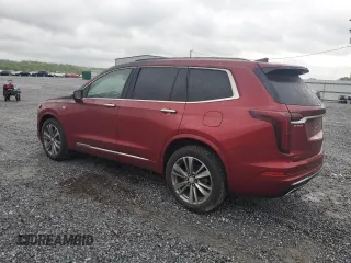 2021 Cadillac XT6 Premium Luxury with VIN 1GYKPDRSXMZ231922, listed as a Copart auction lot 51981065 with 16,784 mi miles and Salvage Title. Bid and sale history available at carsss.com. Image 2.