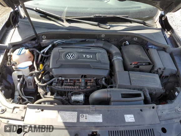 2014 Volkswagen Passat Wolfsburg Edition z VIN 1VWAT7A32EC036093, wystawiony jako Copart lot #52129185 z przebiegiem 106 949 mil mil oraz Szkoda całkowita • Salvage title. Historia ofert i sprzedaży dostępna na DreamBid. Obrazek 13.