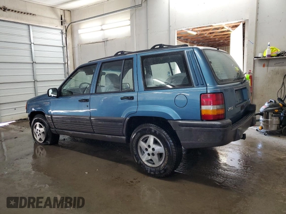 1994 Jeep Grand Cherokee Laredo with VIN 1J4FX58S0RC316030, listed as a Copart auction lot 66178754 with 281,785 mi miles and Salvage Title. Bid and sale history available at carsss.com. Image 2.
