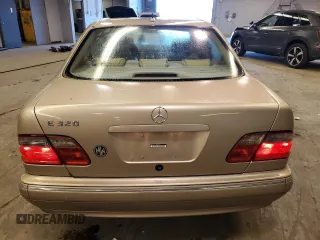 2002 Mercedes-Benz E-Class with VIN WDBJF65J12B485293, listed as a Copart auction lot 77561984 with 140,708 mi miles and Salvage Title. Bid and sale history available at carsss.com. Image 6.