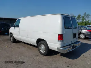 1999 Ford Econoline Cargo with VIN 1FTRE1420XHA34056, listed as a IAAI auction lot 41998411 with 236,267 mi miles. Bid and sale history available at carsss.com. Image 3.