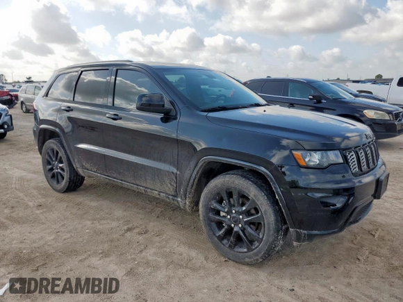 2017 Jeep Grand Cherokee Altitude with VIN 1C4RJEAG2HC854348, listed as a Copart auction lot 60745715 with 87,594 mi miles and Salvage title. Bid and sale history available at DreamBid. Image 4.