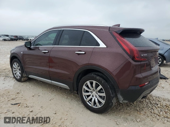 2023 Cadillac XT4 FWD Premium Luxury with VIN 1GYFZCR48PF100078, listed as a Copart auction lot 55955865 with 23,509 mi miles and Salvage title. Bid and sale history available at DreamBid. Image 2.